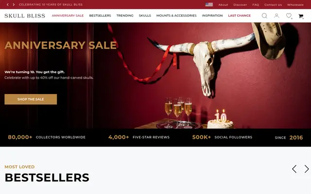Skull Bliss homepage: a carved longhorn skull on a red wall, celebrating ten years